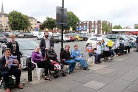 Residents and shoppers held a sit-in protest at Bramley Shopping Centre this weekend urging the centre owners to reinstall all of the benches. Photo: Philip McConnell