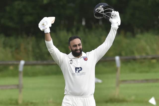 Amir Farooq of North Leeds celebrates his century against Horsforth. Picture: Steve Riding.