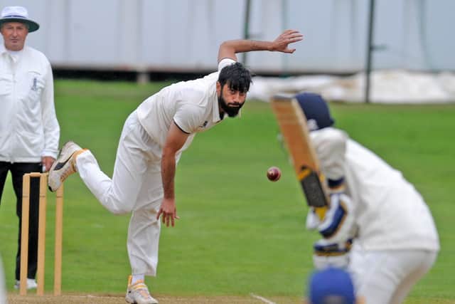 Minhaj Patel of New Rover bowling against Kirkstall Educational in the Aire-Wharfe League. Picture: Steve Riding.