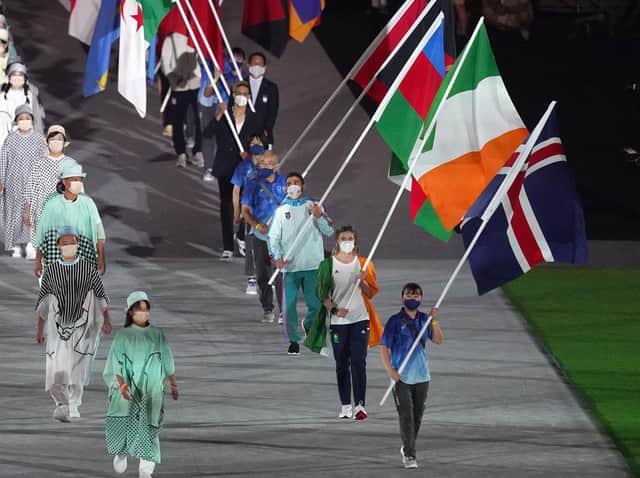 Ireland's Natalya Coyle with the tricolour flag during the closing ceremony of the Tokyo 2020 Olympic Games at the Olympic stadium in Japan.
