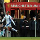 INSTANT HERO: Jermaine Beckford wheels away to celebrate his winning goal for Leeds United in the third round FA Cup tie of January 2010 against arch rivals Manchester United at Old Trafford. Photo by PAUL ELLIS/AFP via Getty Images.