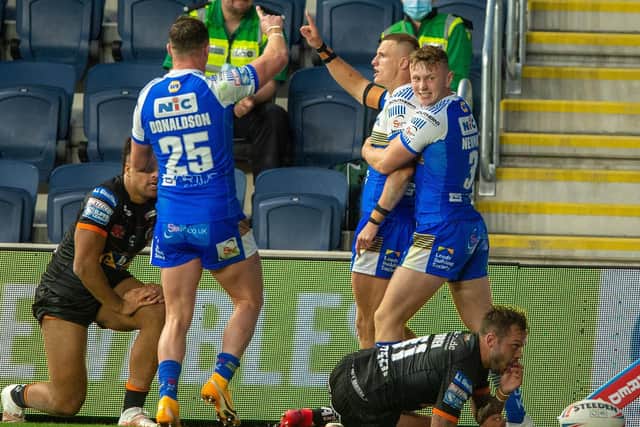 Ash Handley celebrates his try against Tigers, but Leeds did not turn pressure into enough points. Picture by Bruce Rollinson.
