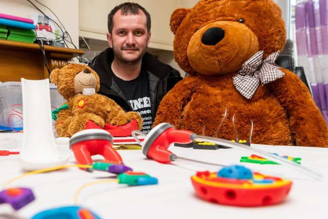 Nick Hardman, pictured in his 3D Toy Shop studio, has made cuddly toys with custom brain implants to match those belonging to children with hyrocephalus
