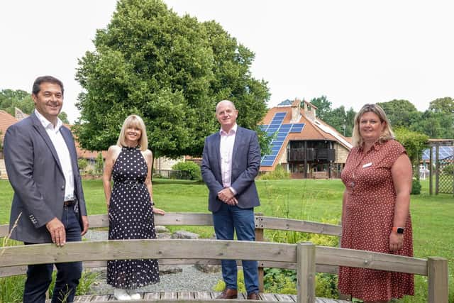 Pictured in the grounds of Martin House are, from left, Linley & Simpson chief executive Nick Simpson, Martin House ambassador Christine Talbot; Linley & Simpson chairman Will Linley, and Martin House chief executive Clair Holdsworth.