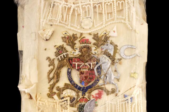 Undated handout photo issued by Dominic Winter Auctioneers of a slice of cake from one of the 23 official wedding cakes made for the Royal Wedding of HRH Prince Charles and Lady Diana Spencer (photo: PA).