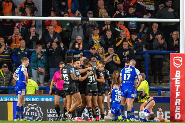 Castleford players celebrate Greg Eden's second try against  
Leeds Rhinos. Picture: Bruce Rollinson.