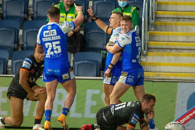 Ash Handley celebrates scoring the Rhinos second try against Castleford Tigers. Picture: Bruce Rollinson.