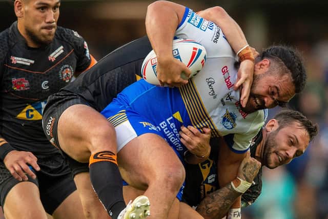 Konrad Hurrell is tackled during Leeds Rhinos' clash with Castleford Tigers. Picture: Bruce Rollinson.