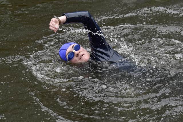 Ruth Price, of Burley, takes part in the first open swimming session held at Leeds Dock. Picture: Steve Riding