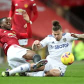 Leeds United’s Kalvin Phillips gets stuck into a tackle with Manchester United’s Aaron Wan-Bissaka when the two side’s last met at Old Trafford in December last year. Picture: Nick Potts/PA.