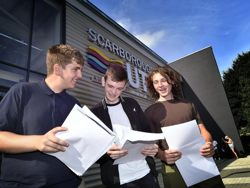 Jake Edmondson, Jack Rowe, Aaron Boston check out their results.