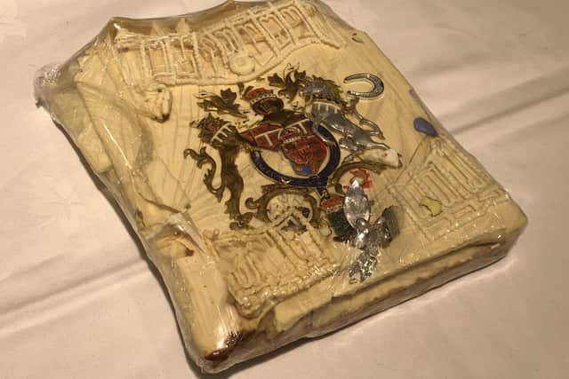The slice of cake from one of the 23 official wedding cakes made for the Royal Wedding of Prince Charles and Lady Diana Spencer on July 29 in 1981