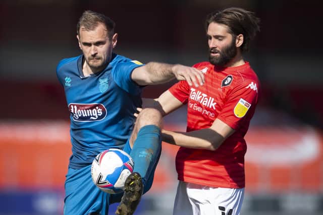 New Farsley Celtic striker James Hanson, left, in action for his former team Grimsby Town. Picture: Joe Prior/Getty Images).
