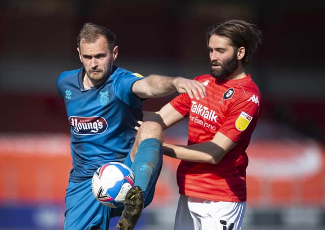 New Farsley Celtic striker James Hanson, left, in action for his former team Grimsby Town. Picture: Joe Prior/Getty Images).