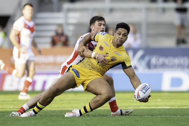 Ball control: Castleford's Derrell Olpherts looks to offload as he is tackled by Lewis Dodd. Picture by Allan McKenzie/SWpix.com