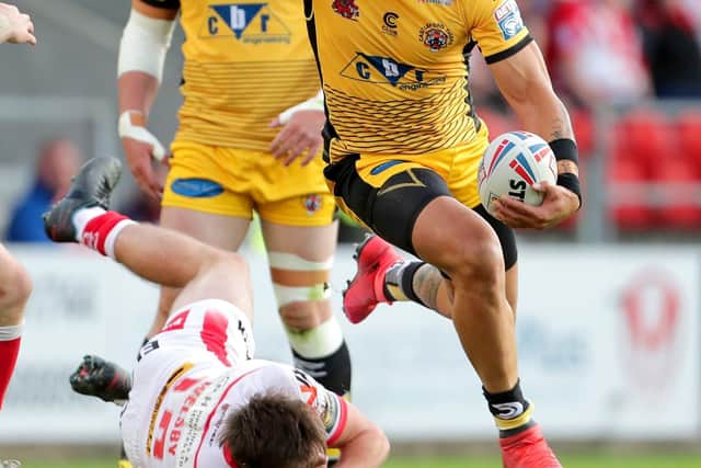 On the move: Castleford Tigers' Jesse Sene-Lefao evades being tackled during last night's famous win. Picture: Richard Sellers/PA Wire.