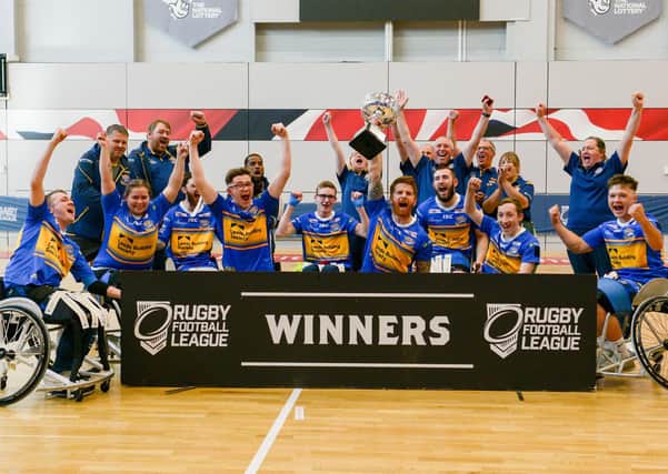 The Leeds Rhinos wheelchair rugby league team celebrate their Challenge Cup final triumph in 2019. Picture: Dean Atkins/SWpix.com.