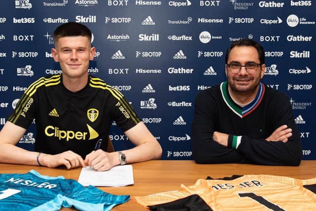 NEW DEAL: For Leeds United goalkeeper Illan Meslier, left, pictured with Whites director of football Victor Orta, right. Picture by LUFC.