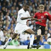 WARRIOR: Leeds United's Lucas Radebe, left, pictured battling a young Ole Gunnar Solskjaer, right, was a regular against Manchester United and almost saved the day as a goalkeeper in April 1996. Photo by Laurence Griffiths/Getty Images.
