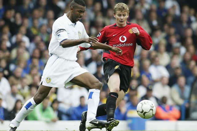 WARRIOR: Leeds United's Lucas Radebe, left, pictured battling a young Ole Gunnar Solskjaer, right, was a regular against Manchester United and almost saved the day as a goalkeeper in April 1996. Photo by Laurence Griffiths/Getty Images.