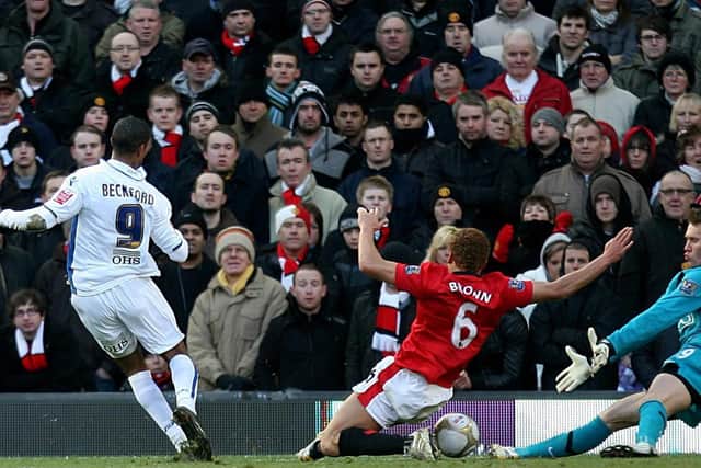 MAKING HISTORY: Jermaine Beckford with a Leeds United strike that is still heralded from the terraces today against Manchester United at Old Trafford back in January 2010. Picture by Martin Rickett/PA Wire.