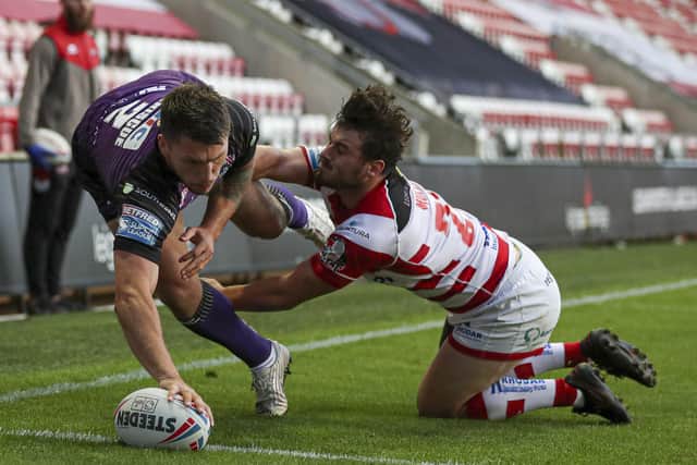 In the corner: Leeds' Tom Briscoe scores his side's second try against Leigh. Picture by Paul Currie/SWpix.com