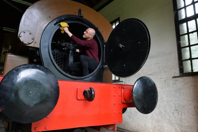 John McGoldrick, curator of industrial history, cleans one of the city’s collection in preparation for the Trains, Trains, Trains event later this month. Picture: Jonathan Gawthorpe