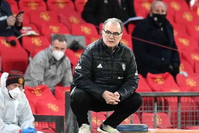 OLD TRAFFORD OPENER: For Leeds United and Whites head coach Marcelo Bielsa, above, pictured looking on in during December's 6-2 defeat to the Red Devils. Photo by MICHAEL REGAN/POOL/AFP via Getty Images.