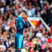 PAINFUL OPENER - Leeds United keeper Illan Meslier was not at fault but picked the ball out of his net five times at Manchester United on a dark day for the Whites. Pic: Tony Johnson