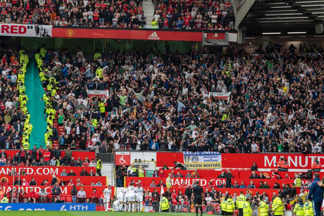 TURNING POINT: Luke Ayling's stunning strike sent the travelling Leeds United contingent wild at Old Trafford, above, but the game quickly turned on its head. Picture by Tony Johnson.