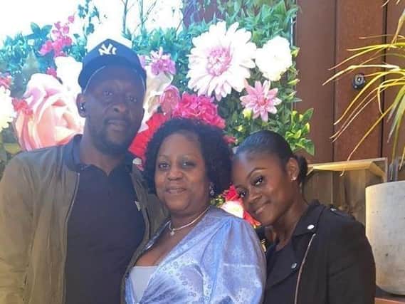 Damion Thompson pictured with his wife, Linda Rose, and stepdaughter Rebecca.