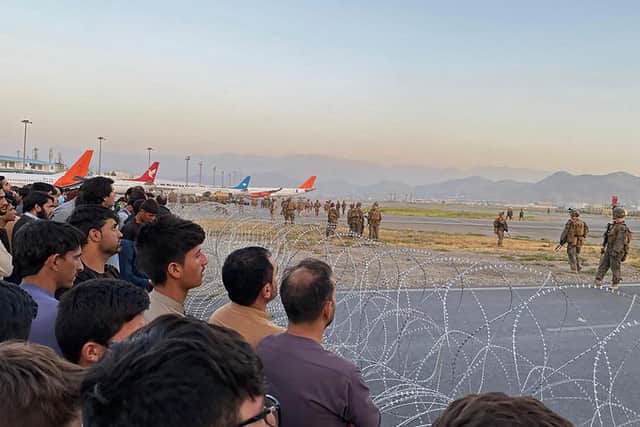Scenes at the airport in Kabul as Afghans bid to leave the country.
Getty Images