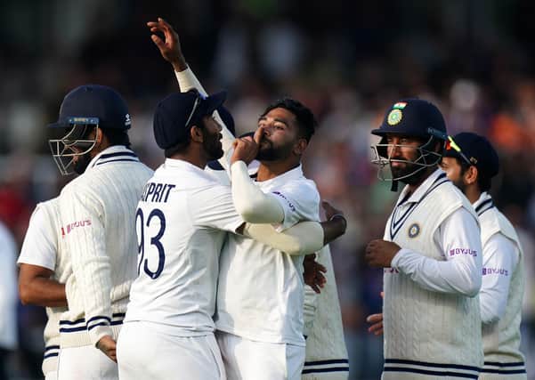 Quiet: India's Mohammed Siraj (centre) celebrates taking the wicket of England's Jos Buttler during his side's victory at Lord's. Picture: Zac Goodwin/PA Wire.