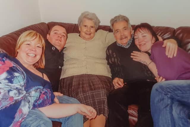 A family photo featuring Debbie Skenfield's sister Karen, brother Andy, Betty and Geoff and Debbie.
