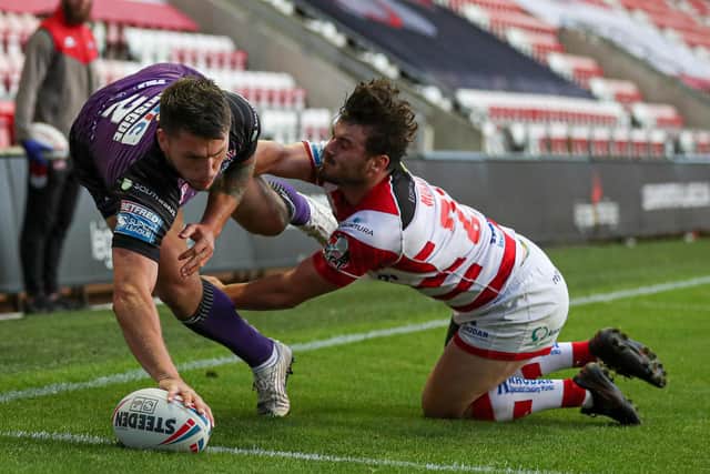 Leeds Rhinos' Tom Briscoe touches down at Leigh. Picture: Paul Currie/SWpix.com.
