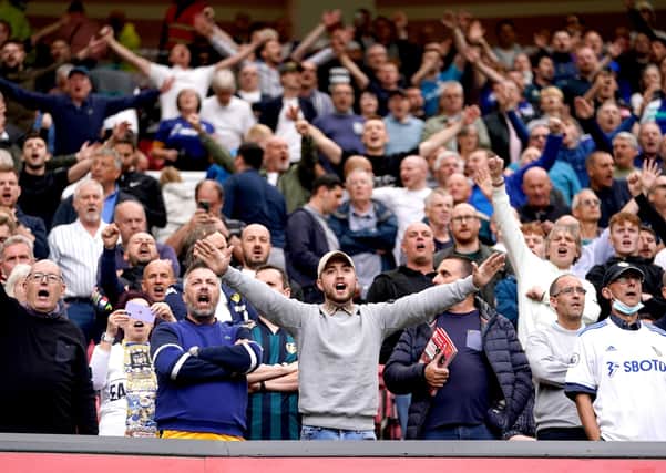 Leeds United supporters get behind their team at Old Trafford last weekend. A full house is expected at Elland Road for the visit of Rafael Benitez’s Everton tomorrow. Picture: Martin Rickett/PA Wire.