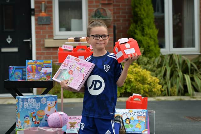 Seven-year-old Scott Summers has set up a charity stall outside his house in Cross Gates to raise money for Cancer charities, after suffering from the disease himself