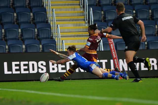 Full stretch: Leeds full-back Richie Myler goes over to score his side's second try.

Picture: Jonathan Gawthorpe