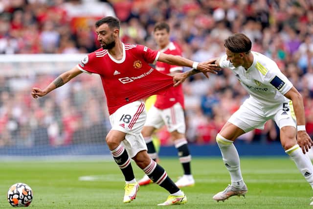 In top form: Manchester United's Bruno Fernandes getting away from Leeds United's Robin Koch at Old Trafford.