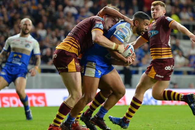 Kruise Leeming's progress is halted during last Friday's game against Giants. Picture by Jonathan Gawthorpe.