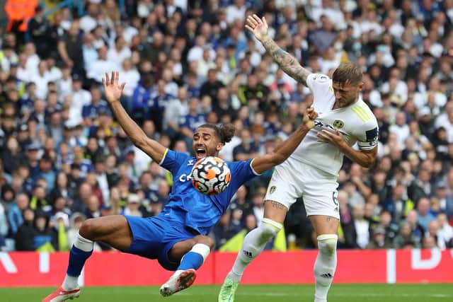 FLASHPOINT: Everton striker Dominic Calvert-Lewin goes to ground after a shirt pull from Whites captain Liam Cooper for what was eventually deemed a penalty in Saturday's 2-2 draw against Leeds United. Photo by Jan Kruger/Getty Images.