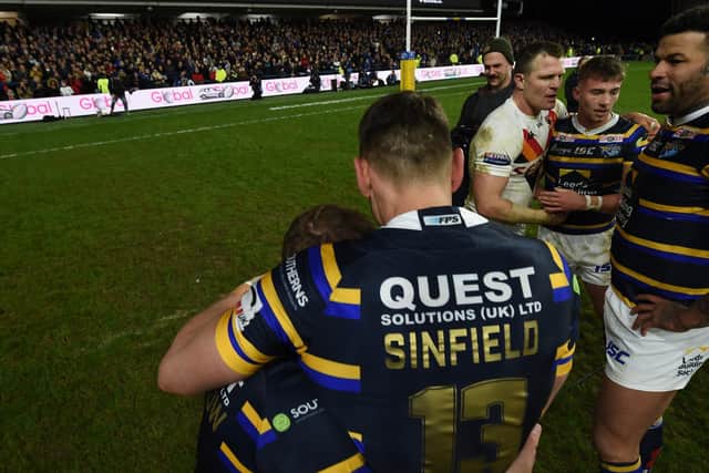 Leeds Rhinos legends Kevin Sinfield and Rob Burrow embrace after last year's fundraising game for Burrow and Jamie Jones-Buchanan - the image which could now be formed into a sculpture. (VARLEYS)