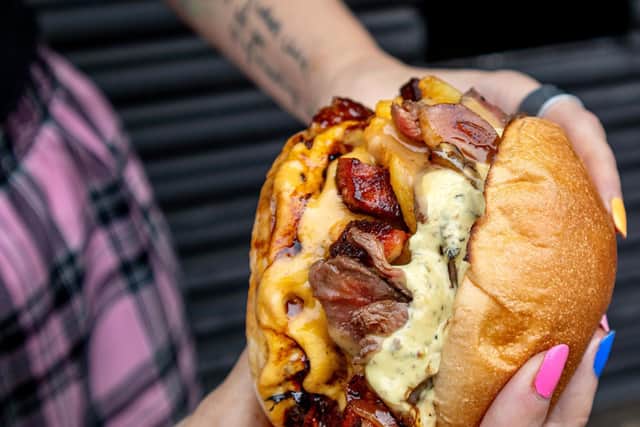 The Butter, Blood and Bleu - a double cheeseburger served with buttered steak, chorizo and creamy blue cheese sauce