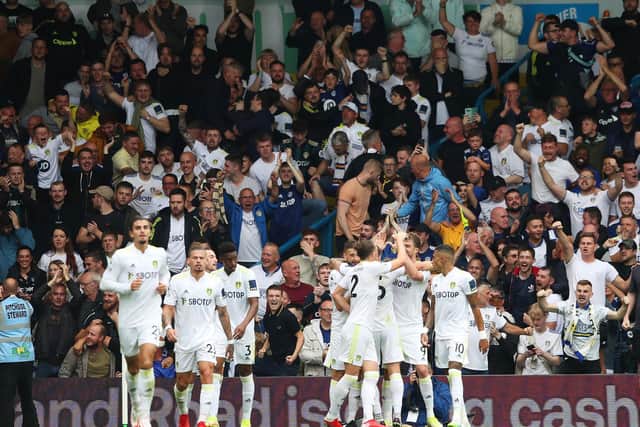 NORMALITY RETURNS: Leeds United's fans celebrate Mateusz Klich's strike in Saturday's 2-2 draw against Everton as a capacity crowd finally returned to Elland Road in full. Photo by Jan Kruger/Getty Images.