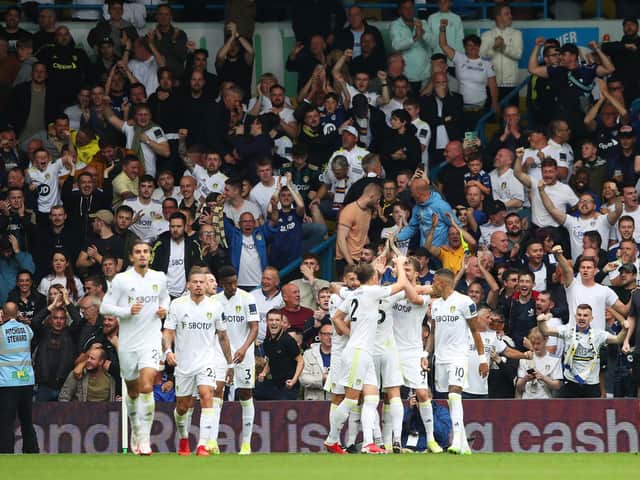 NORMALITY RETURNS: Leeds United's fans celebrate Mateusz Klich's strike in Saturday's 2-2 draw against Everton as a capacity crowd finally returned to Elland Road in full. Photo by Jan Kruger/Getty Images.