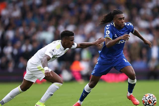 BATTLE: Leeds United's summer signing Junior Firpo, left, was tasked with keeping tabs on Everton's Alex Iwobi, right, in Saturday's 2-2 draw at Elland Road.  Photo by Marc Atkins/Getty Images.