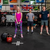 Laura Collins, YEP Editor, pictured with Dan Jeffrey, owner at Crossfit CrossHills, and coach Chris Hull. Pic: James Hardisty