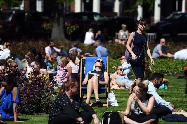 People enjoying the weather in Leeds.