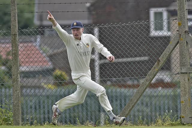 Townville fielder Charlie Sykes takes a great over his head catch to dismiss Ben Walter of East Bierley off the bowling of Ritchie Bresnan in the Priestley Cup semi-final. Picture: Steve Riding.