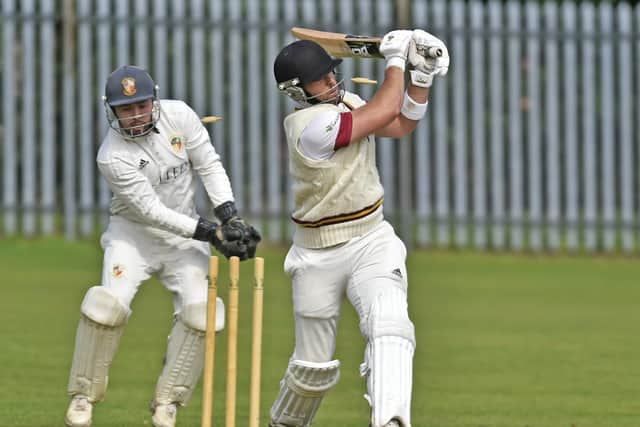 East Bierley opener Matthew West is bowled by Conor Harvey of Townville in the Priestley Cup semi-final. Picture: Steve Riding.